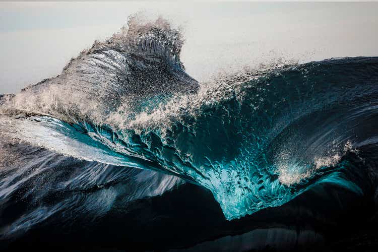 Extreme close up of thrashing emerald ocean waves