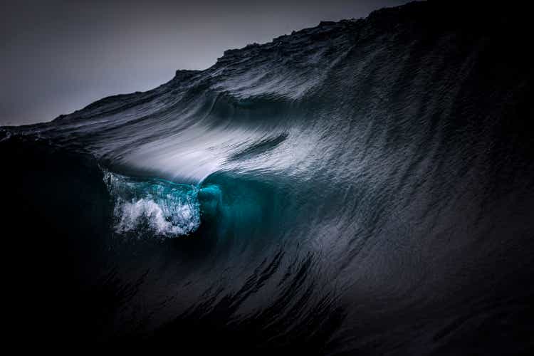 Full frame crisp detail of dark blue ocean wave