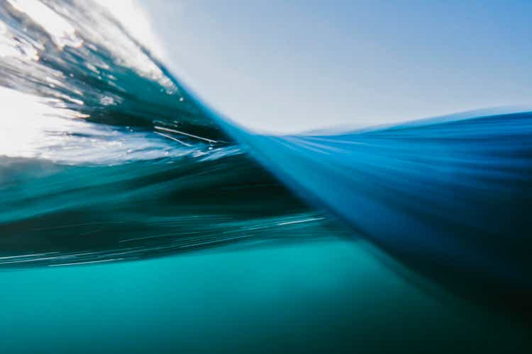 Vortex split view of blue ocean waters surface