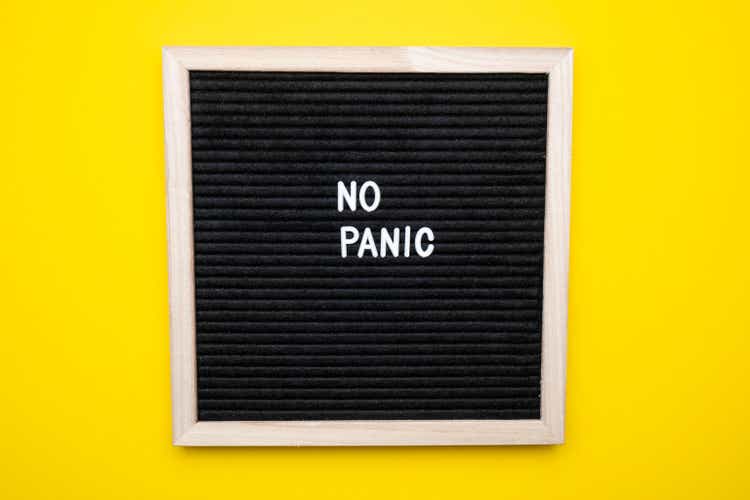 No panic test on a felt board on a yellow background