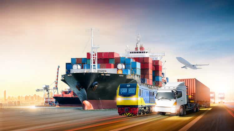 Global business logistics import export and container cargo freight ship, Airplane, container truck on highway with Freight Train at cargo port, Transportation industry concept, Depth blur effect