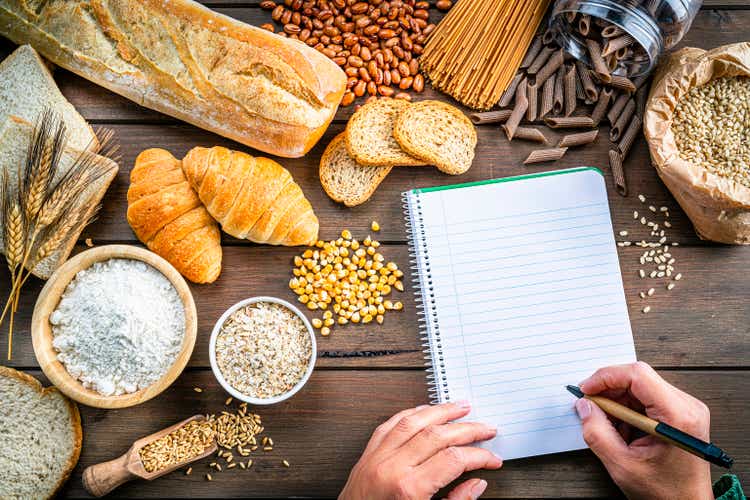 Writing list of carbohydrates, wholegrain and dietary fiber