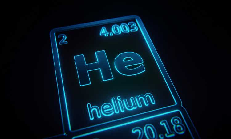 Focus on chemical element Helium illuminated in periodic table of elements. 3D rendering