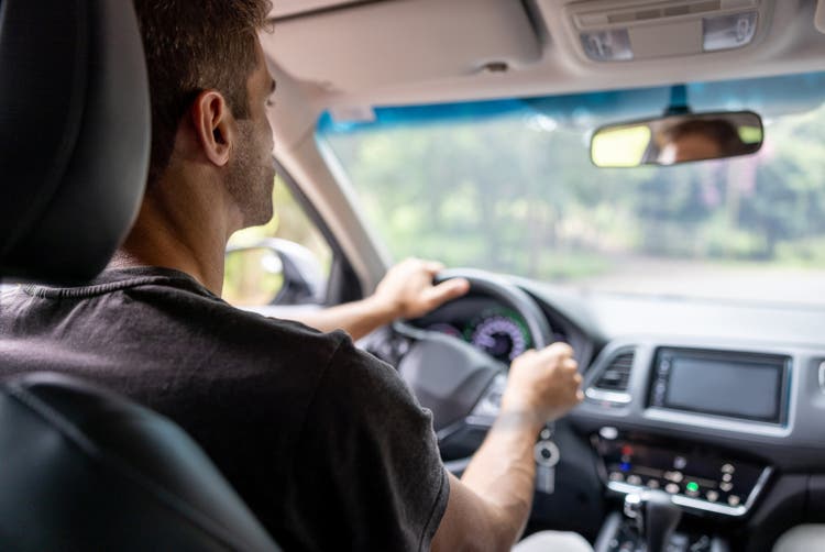 Man driving a car