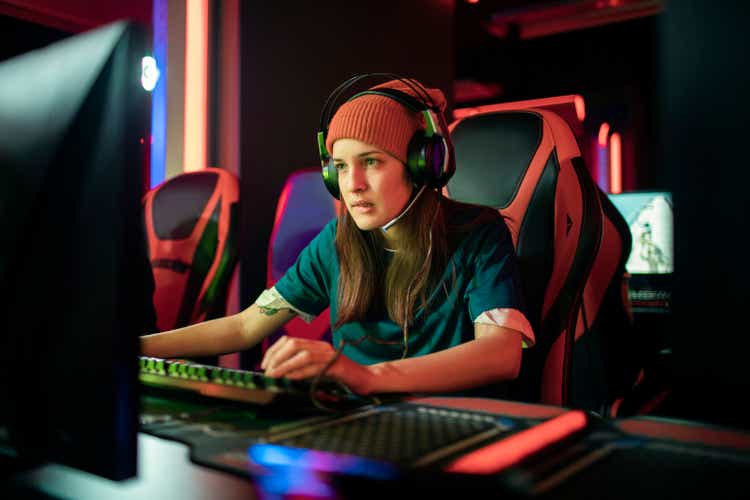 Female eSports player competing in a eSports tournament