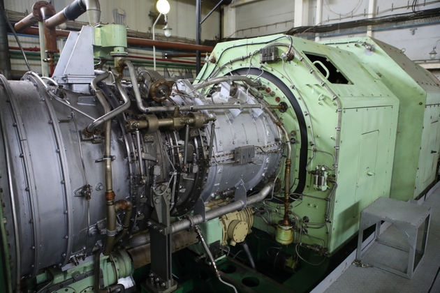 Gas transportation system. Booster pumping station for gas. Gas filling station and gas tanks. Transportation of gas around the world. Oil and gas sector. Gas turbines.