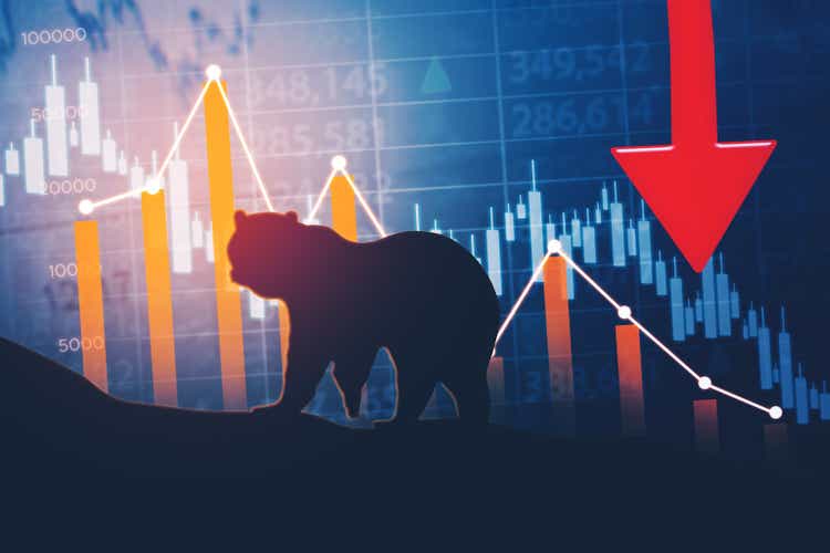 Bear walking with declining finance chart