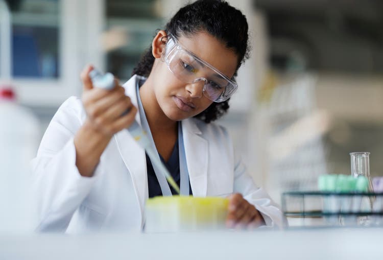 Young female scientist working in laboratory