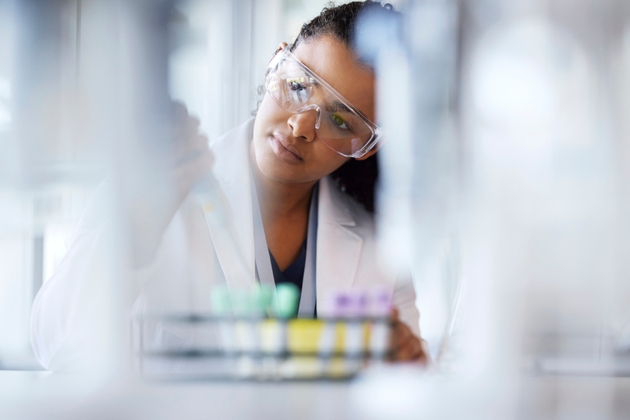 Young female scientist working in laboratory