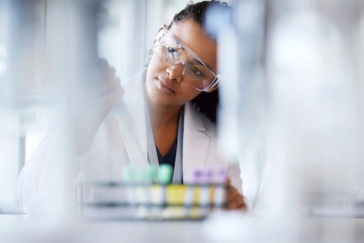 Young female scientist working in laboratory