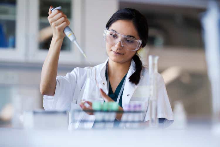 Young female scientist working in laboratory