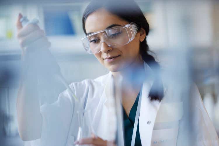 Young female scientist working in laboratory