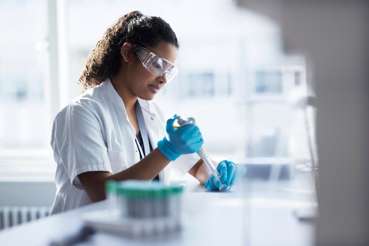 Young female scientist working in laboratory