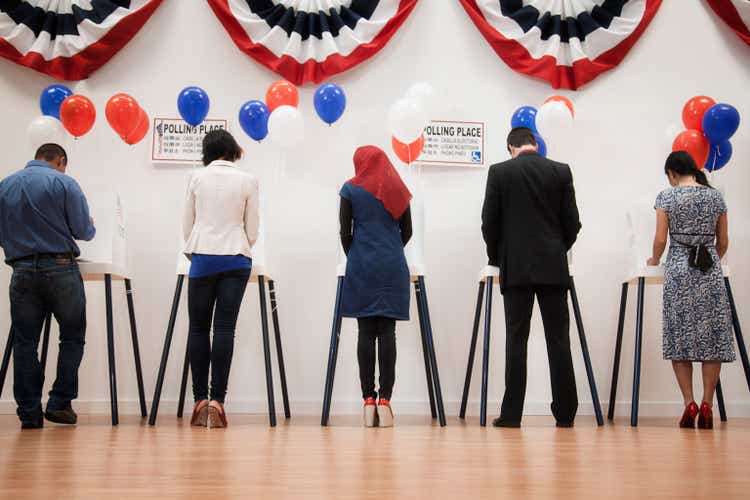 Voters voting in polling place