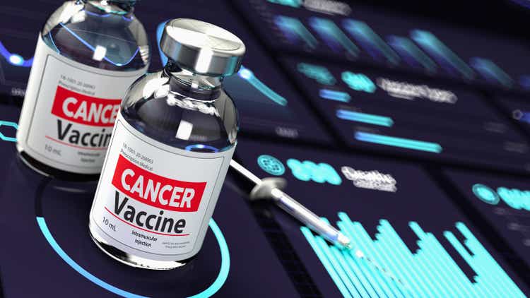 Cancer Vaccine Research Concept Vaccine and Syringe on Graphics