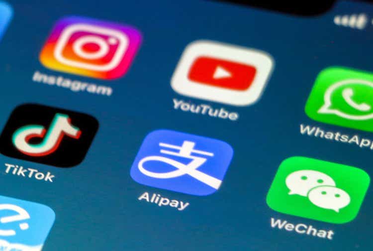 Chinese Social Media Apps, WeChat, Alipay and Tik Tok in focus, as 3 Western Social Media Apps, Instagram, YouTube and WhatsApp are out of focus