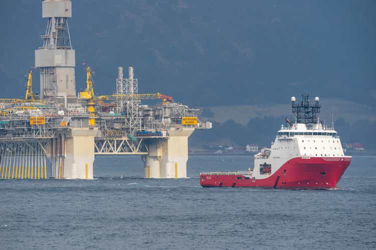 Rig move of Equinor oil platform Njord Alpha with ahts vessel Siem Pearl innside the Norwegian fjord.
