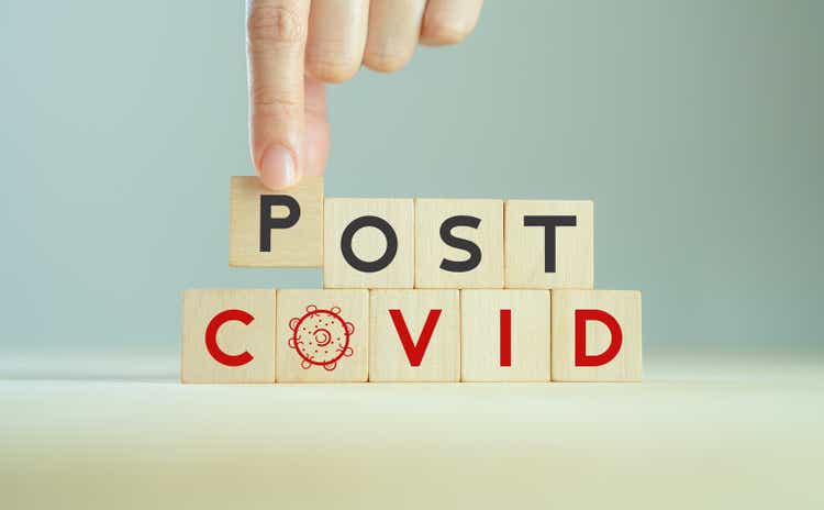 Post covid concept. Hope and the end. Long covid; long-term effects of coronavirus. Chronic fatigue, feeling tired easily. Medical, treatment long covid symstoms, recovery tips.Wooden cube blocks.