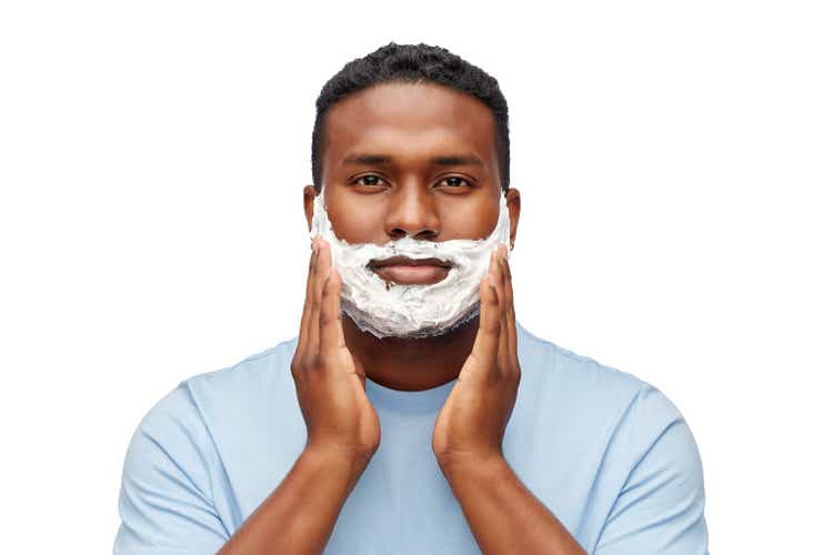 african american man with shaving cream on beard