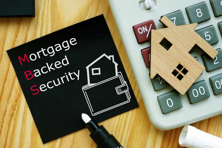 Mortgage Backed Security MBS is shown on the photo using the text