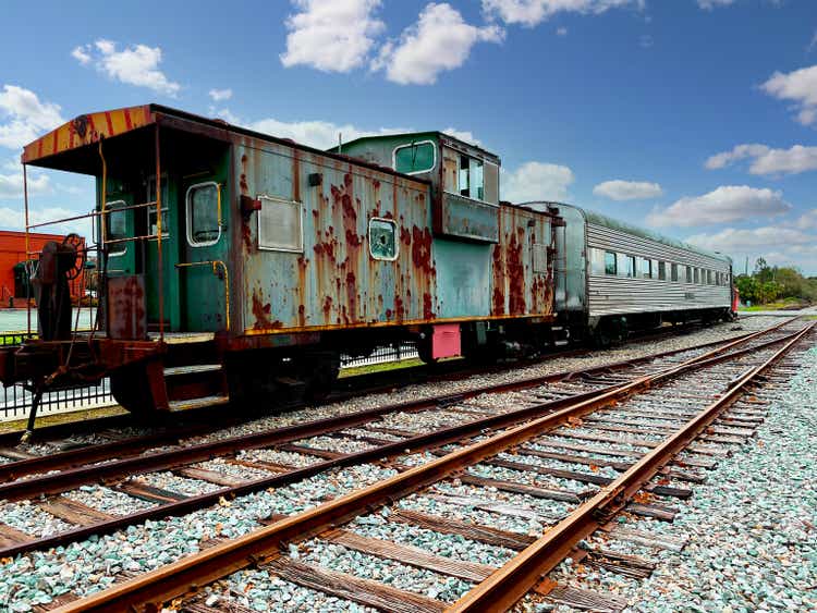 vintage retired old train railroad card rusty caboose lounge car rusted abandoned empty rail machine