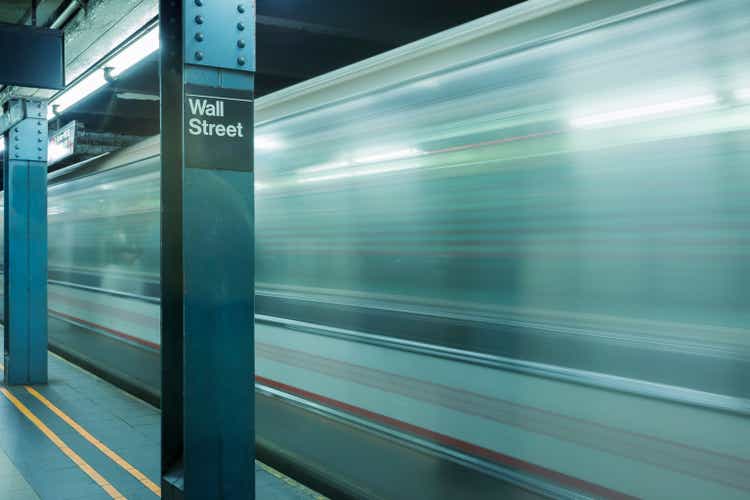 Subway in motion at Wall Street station, New York