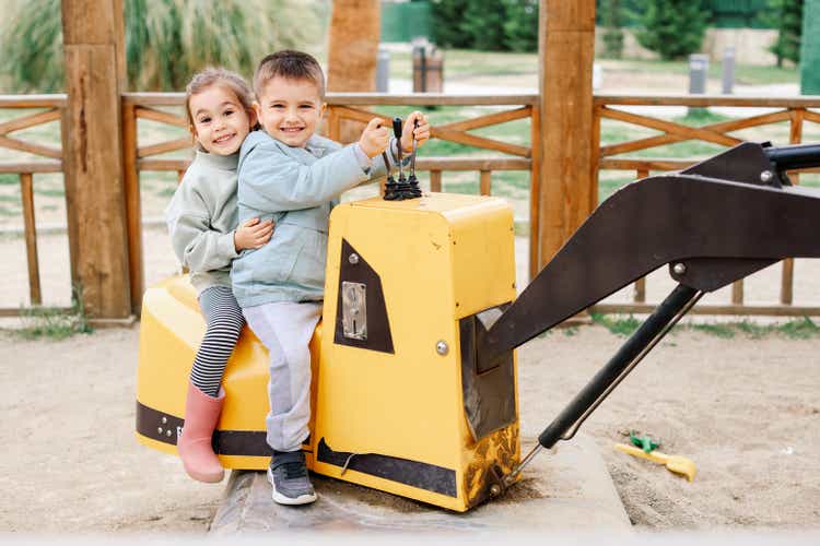 Children"s Playground at the public park with training in operating the excavato