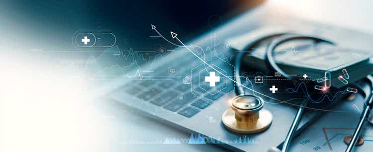 Healthcare concern graph and information of Medical concern maturation and golden stethoscope of doc connected laptop, investment, fiscal and banking, Medical concern study connected planetary network.