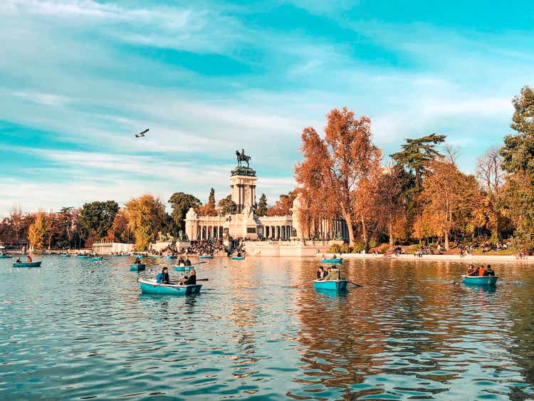 Madrid, Spain - 8 of December, 2018: Tourists on a boats enjoying the day on a lake in Madrid Retiro Park, Spain