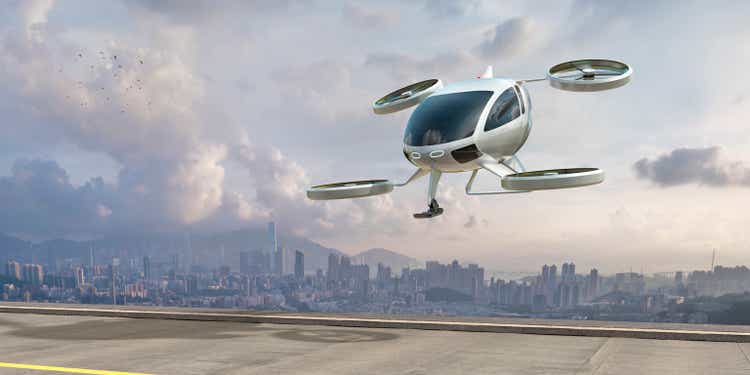 eVTOL Electric Vertical Take Off and Landing Aircraft About To Land Near City