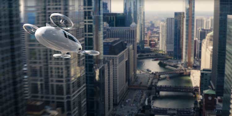 eVTOL Electric Vertical Take Off and Landing Aircraft Flying Through Skyscrapers