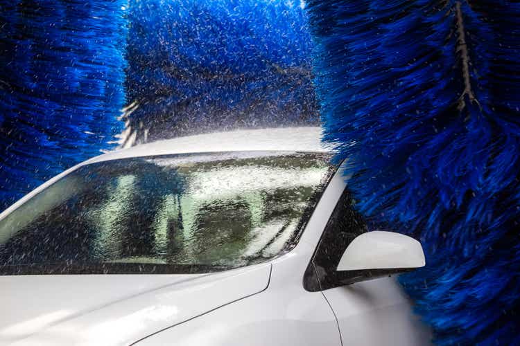 Washing the car in an automatic washing machine. Brushed Car Washing Machine