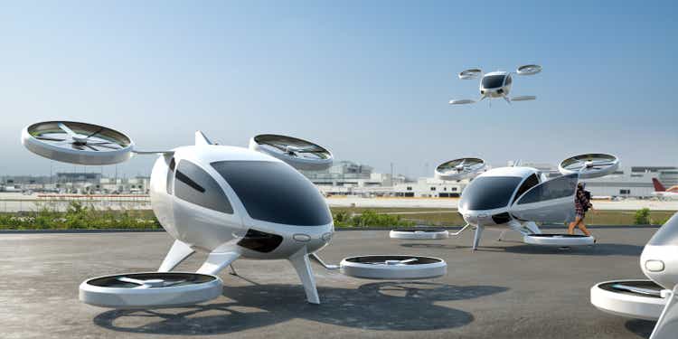 Fleet of Electric Vertical Take Off and Landing eVTOL Aircraft Used As Airport Shuttles