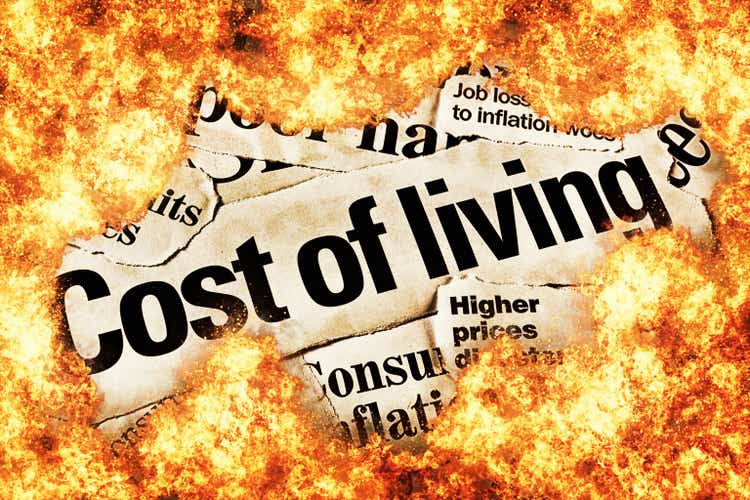 Inflation burns consumers: newspaper headlines about rising prices, consumed by fire