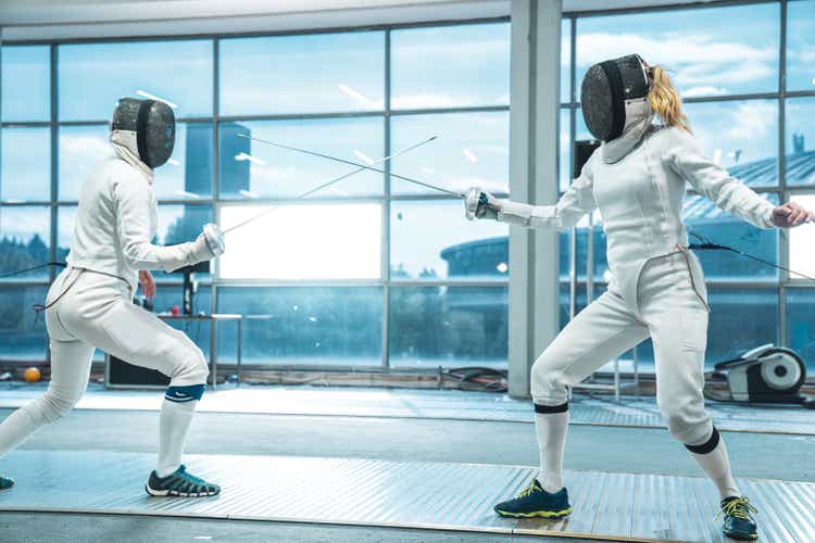 Female fencing competitive duel