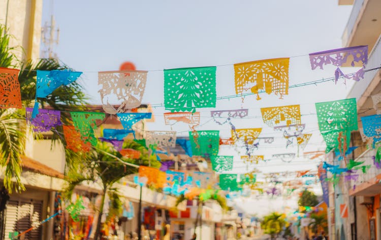 Flags are waving on the street of small Mexican town