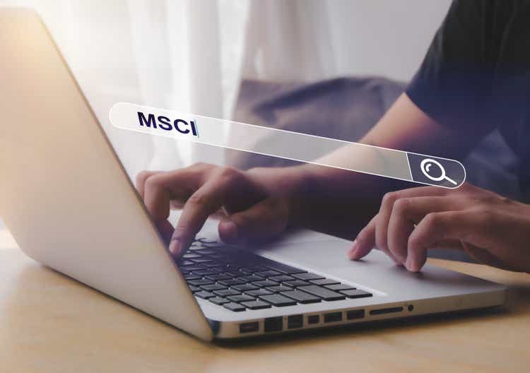 Human hand uses a computer to find MSCI words.