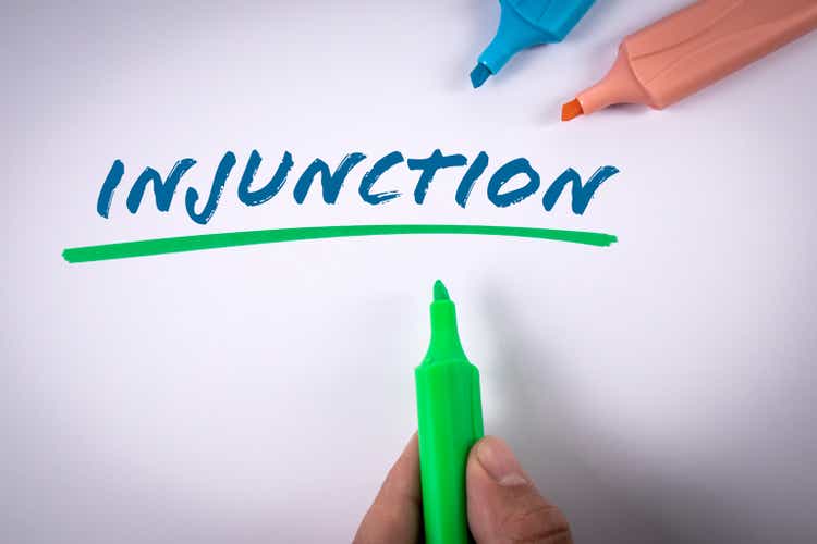 Injunction. Text and colored markers on a white background