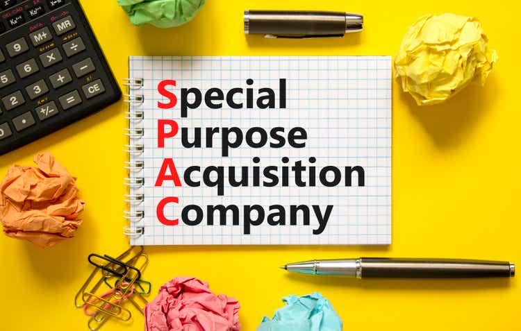 SPAC special purpose acquisition company symbol. Concept words SPAC special purpose acquisition company on beautiful yellow background. Business SPAC special purpose acquisition company concept.