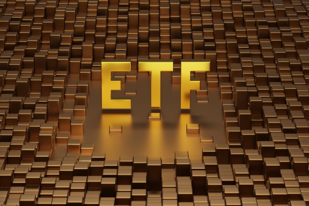 Golden ETF solid word on metallic cubes. 3d illustration.
