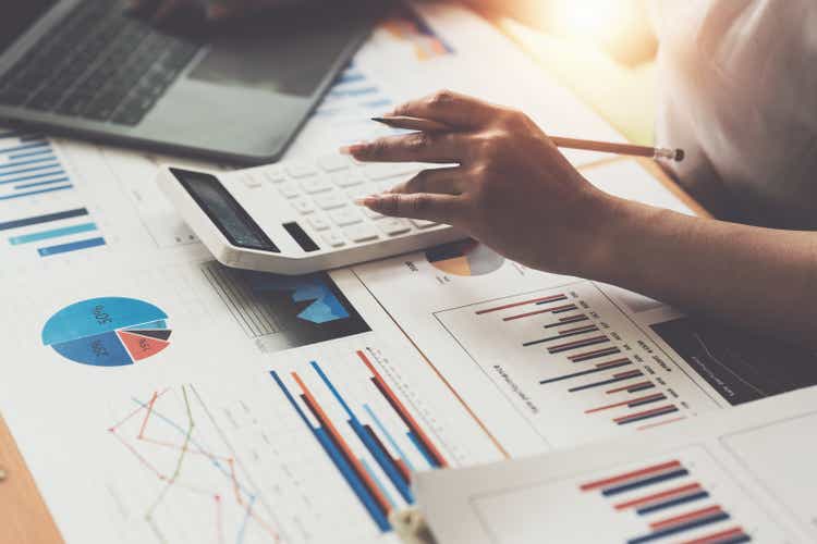 Asian Business woman consult advice to customer about finance plan. Account concept.