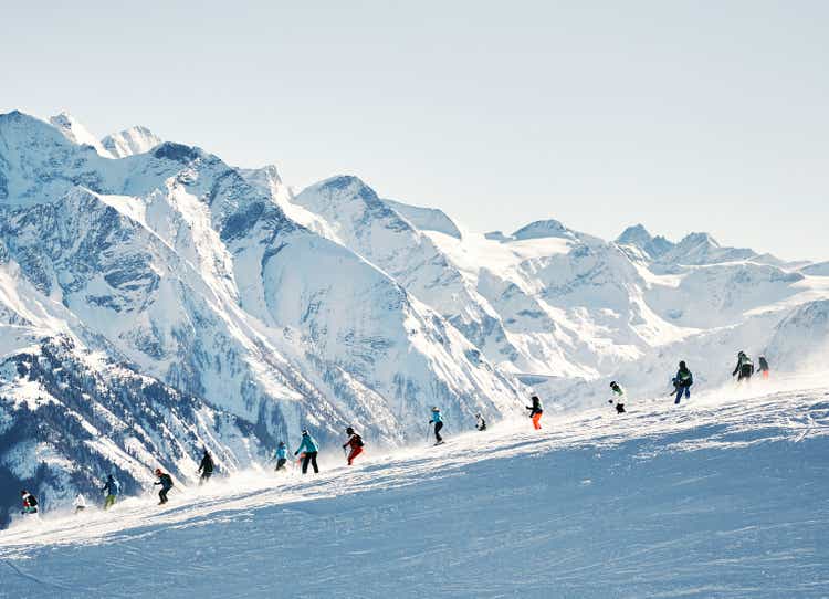Skiers with amazing mountain range in the background