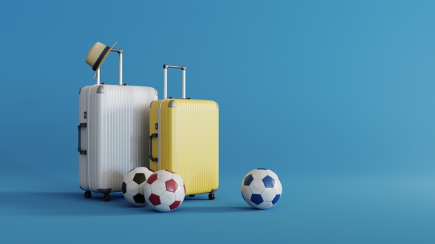 two tour luggage and football