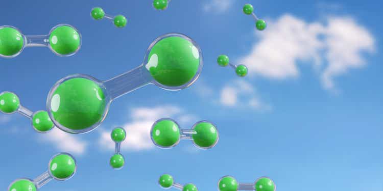 Green hydrogen molecules floating in the air on blue background. 3d illustration.