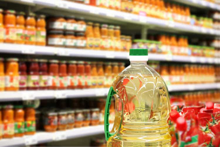 Choosing food from shelf in supermarket,vegetables in grocery section,Grocery stores