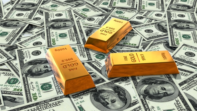 100 dollar bills with gold bars background. Many banknotes.