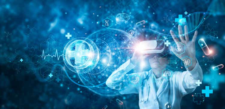 Medicine doctor wearing virtual reality glasses checking and testing result of patient with simulator on media futuristic medical, Science, Innovation and technology of healthcare.