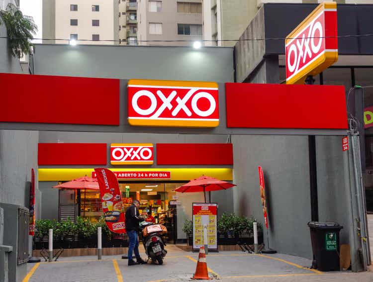 Exterior view of facade of OXXO mini market 24h
