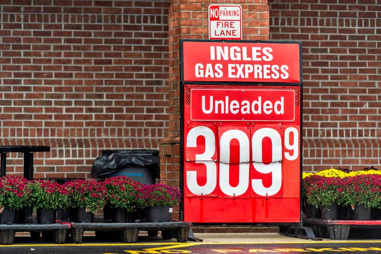Gray, Georgia local chain food store entrance sign for Ingles market grocery shop closeup of red text for gas express unleaded with 3 dollars per gallon