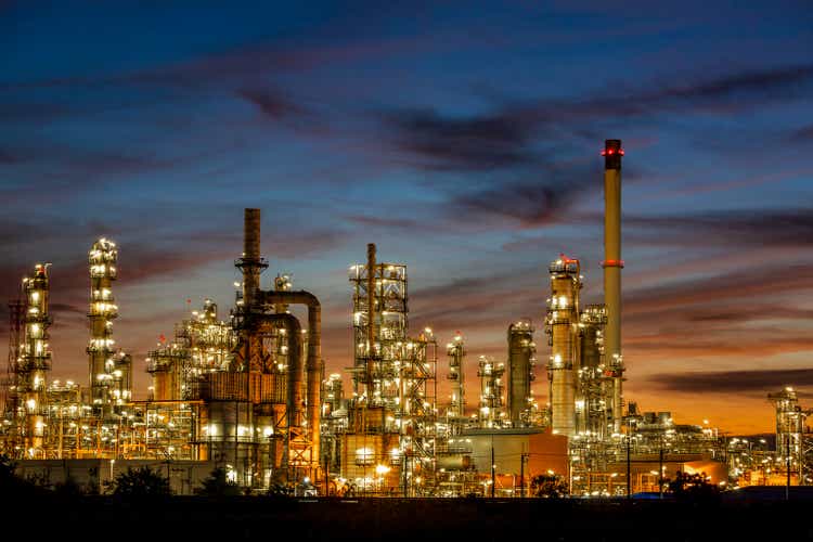 Twilight scene of tank oil refinery plant and tower column of Petrochemistry